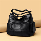 Four Seasons Crossbody Handbag