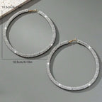 A Pair of Sparkling Diamond Earrings