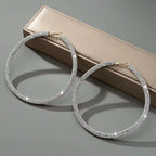 A Pair of Sparkling Diamond Earrings